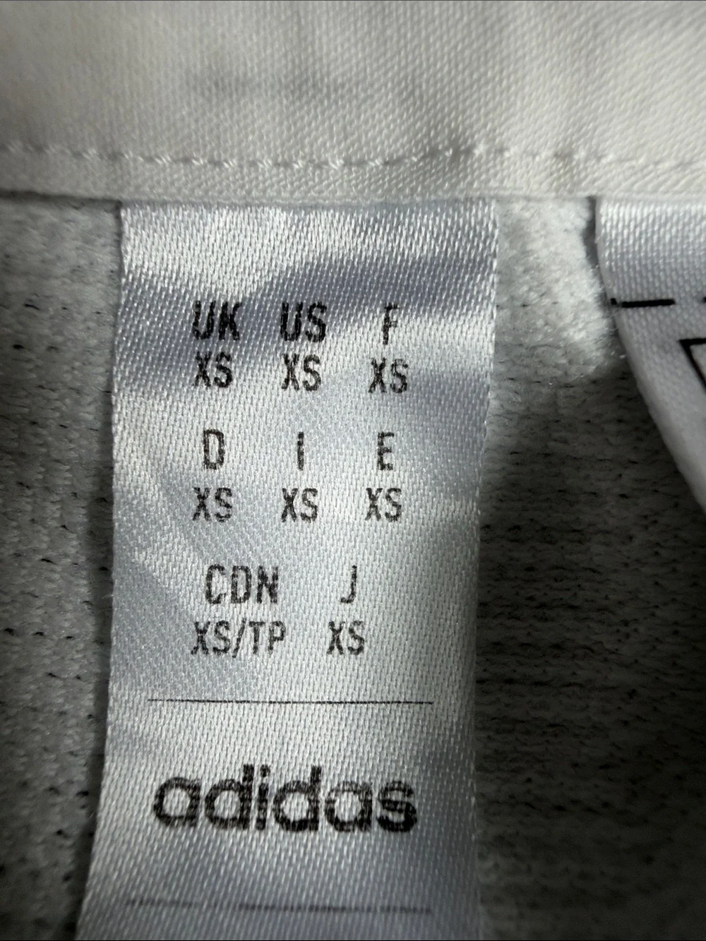 adidas White Short-Sleeve Tennis Shirt with Navy Logo